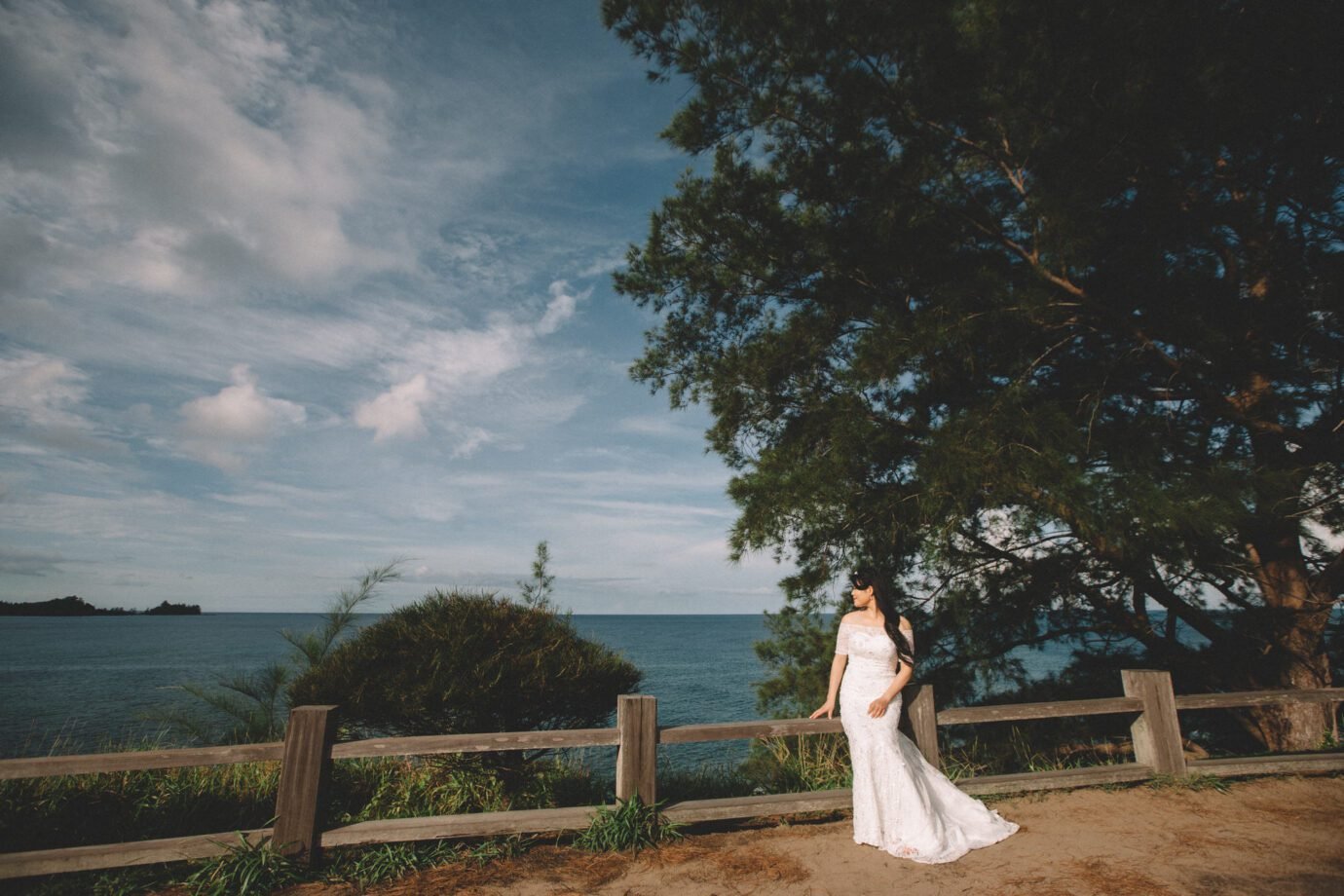 Malaysia Best Prewedding Destination Kota Kinabalu Engagement Photography Cliff Choong wedding photographer nature beach cloud blue sky kiss couple hug veil bridal gown