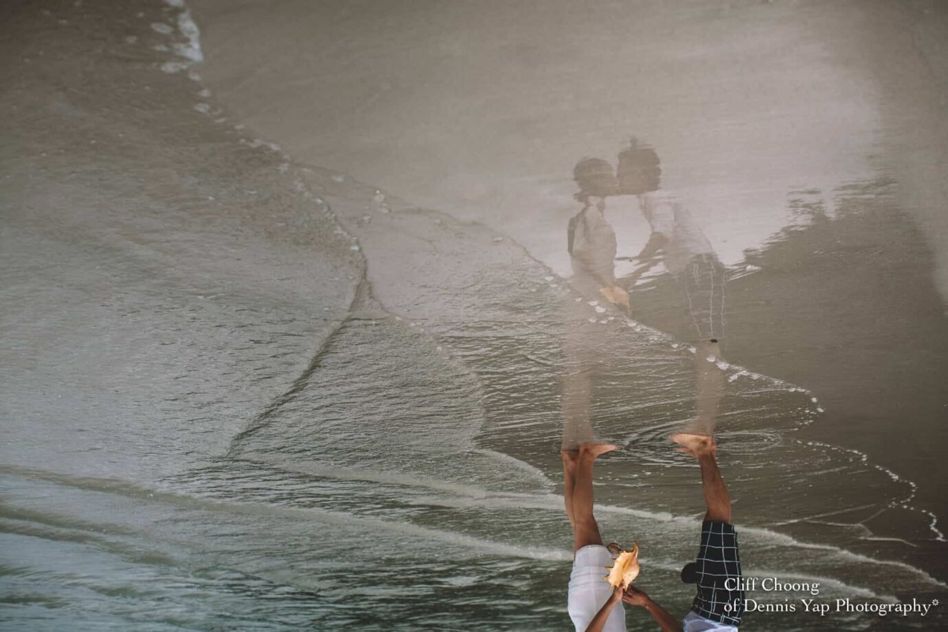 Malaysia Best Prewedding Destination Kota Kinabalu Engagement Photography Cliff Choong wedding photographer nature beach cloud blue sky kiss couple hug veil bridal gown