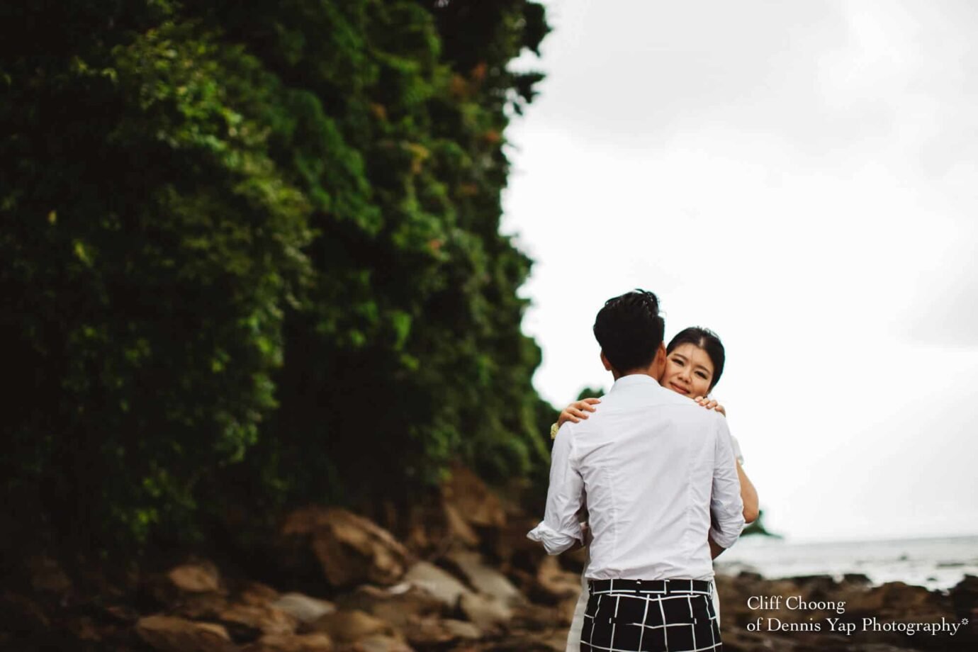 Malaysia Best Prewedding Destination Kota Kinabalu Engagement Photography Cliff Choong wedding photographer nature beach cloud blue sky kiss couple hug veil bridal gown