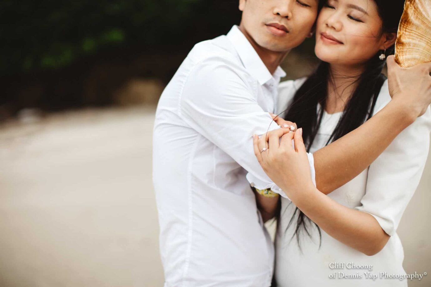 Malaysia Best Prewedding Destination Kota Kinabalu Engagement Photography Cliff Choong wedding photographer nature beach cloud blue sky kiss couple hug veil bridal gown