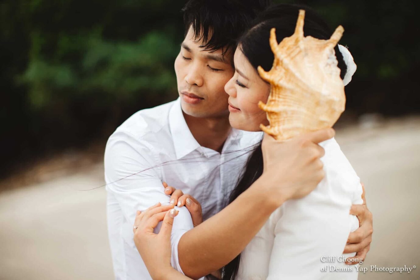 Malaysia Best Prewedding Destination Kota Kinabalu Engagement Photography Cliff Choong wedding photographer nature beach cloud blue sky kiss couple hug veil bridal gown