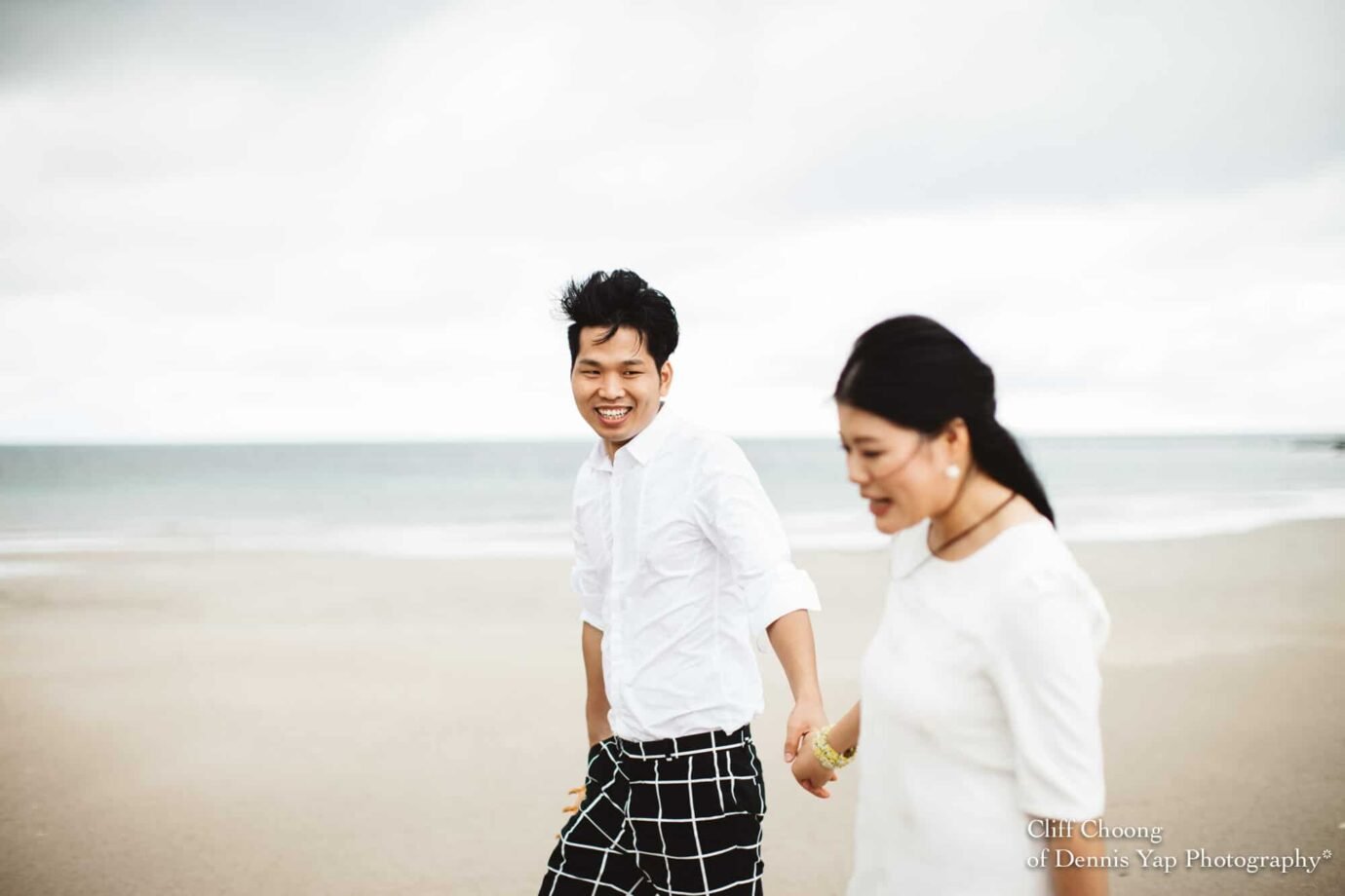 Malaysia Best Prewedding Destination Kota Kinabalu Engagement Photography Cliff Choong wedding photographer nature beach cloud blue sky kiss couple hug veil bridal gown