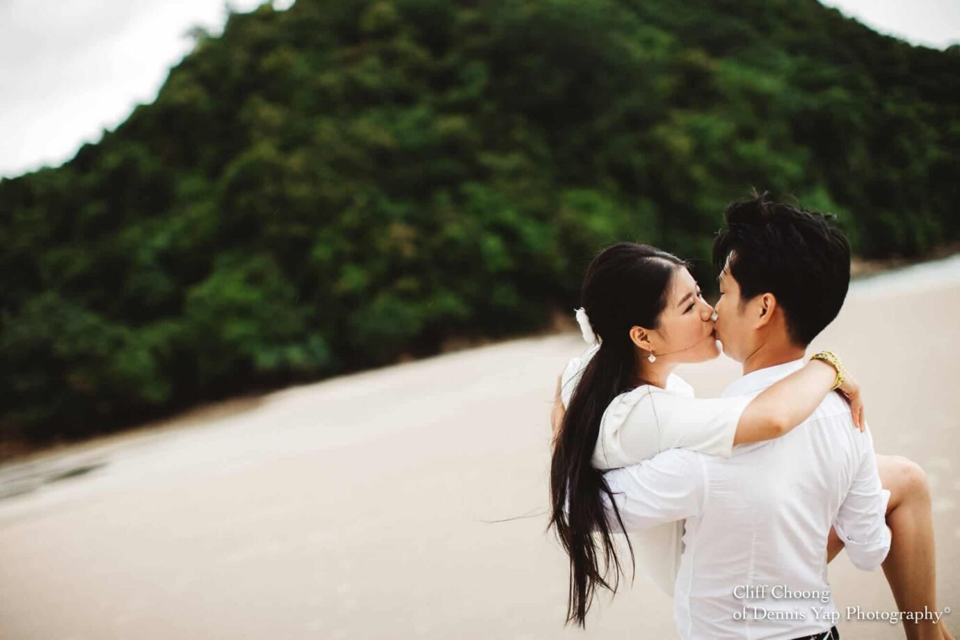 Malaysia Best Prewedding Destination Kota Kinabalu Engagement Photography Cliff Choong wedding photographer nature beach cloud blue sky kiss couple hug veil bridal gown