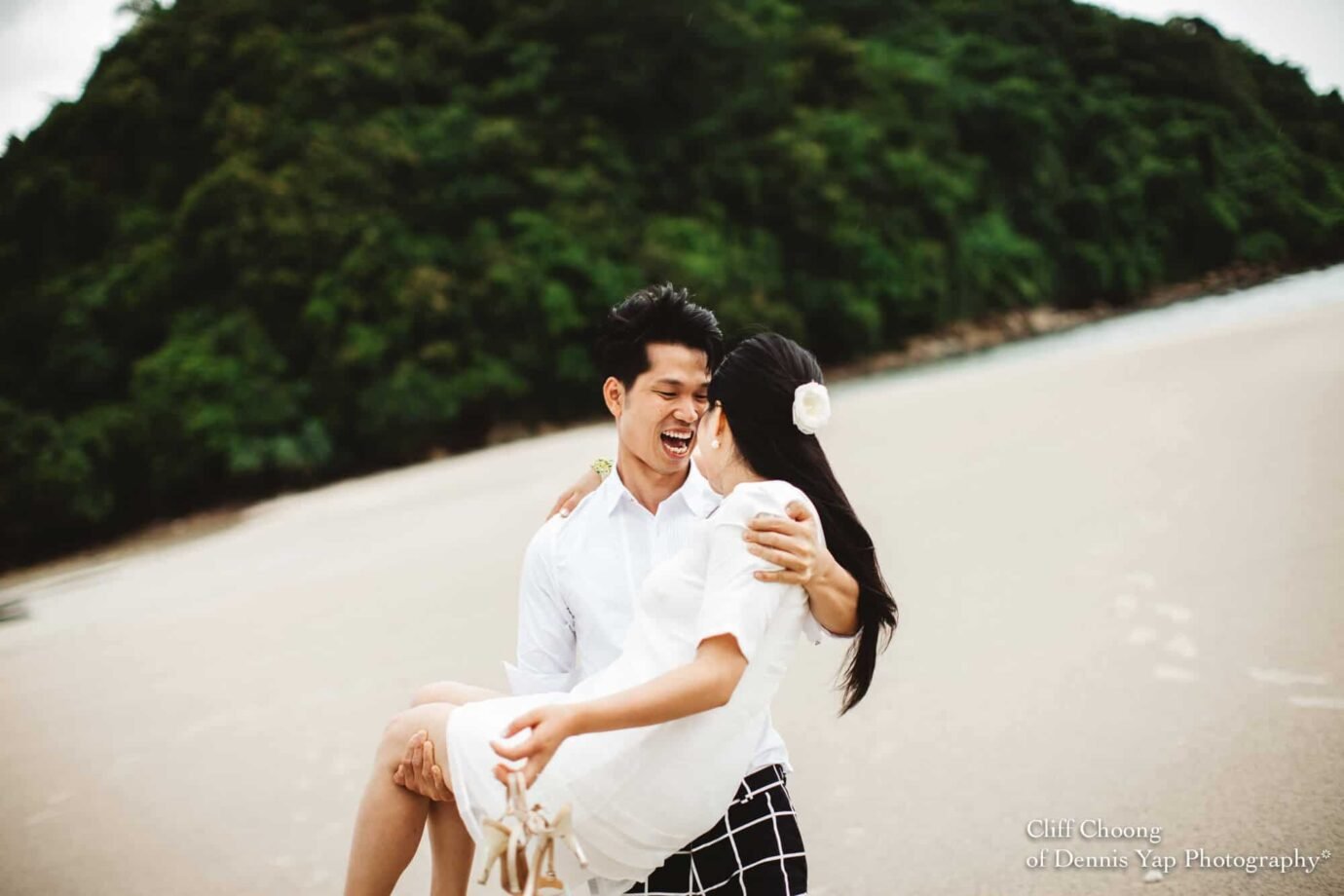 Malaysia Best Prewedding Destination Kota Kinabalu Engagement Photography Cliff Choong wedding photographer nature beach cloud blue sky kiss couple hug veil bridal gown