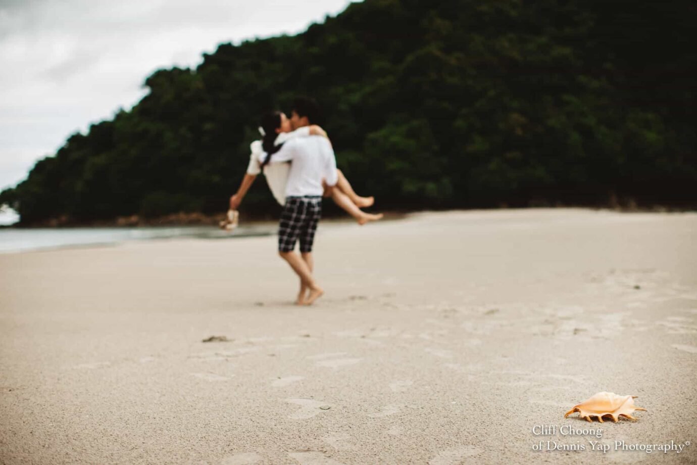 Malaysia Best Prewedding Destination Kota Kinabalu Engagement Photography Cliff Choong wedding photographer nature beach cloud blue sky kiss couple hug veil bridal gown