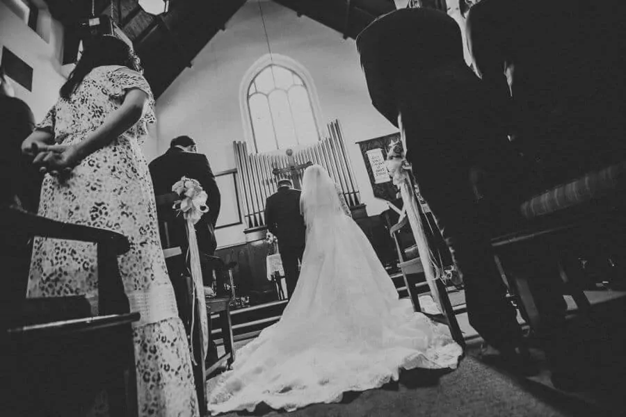 Black and white newlywed photo Wedding St. Andrew Church Kuala Lumpur Malaysia Destination Cliff Choong Photography white fairy tail beautiful wedding gown dress Classic Simple elegant 