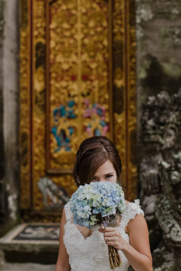 ULUN DANU BERATAN TEMPLE AND LAKE BERATAN cliff choong destination portrait and wedding photographer malaysia kuala lumpur bali adventure sea waterfall prewedding shots bride and groom boat on the water