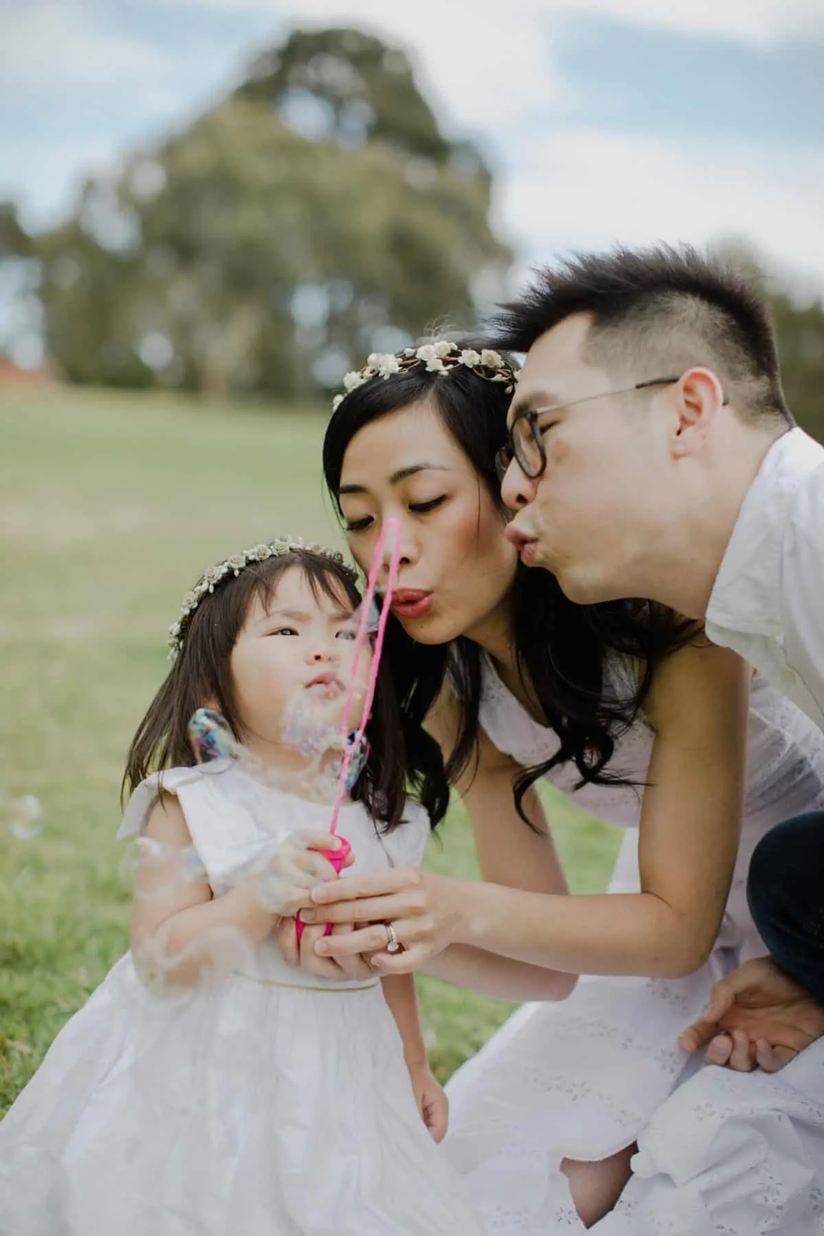 Happy Family Portrait Session With fun relax casual cozy lifestyle playful at the green park