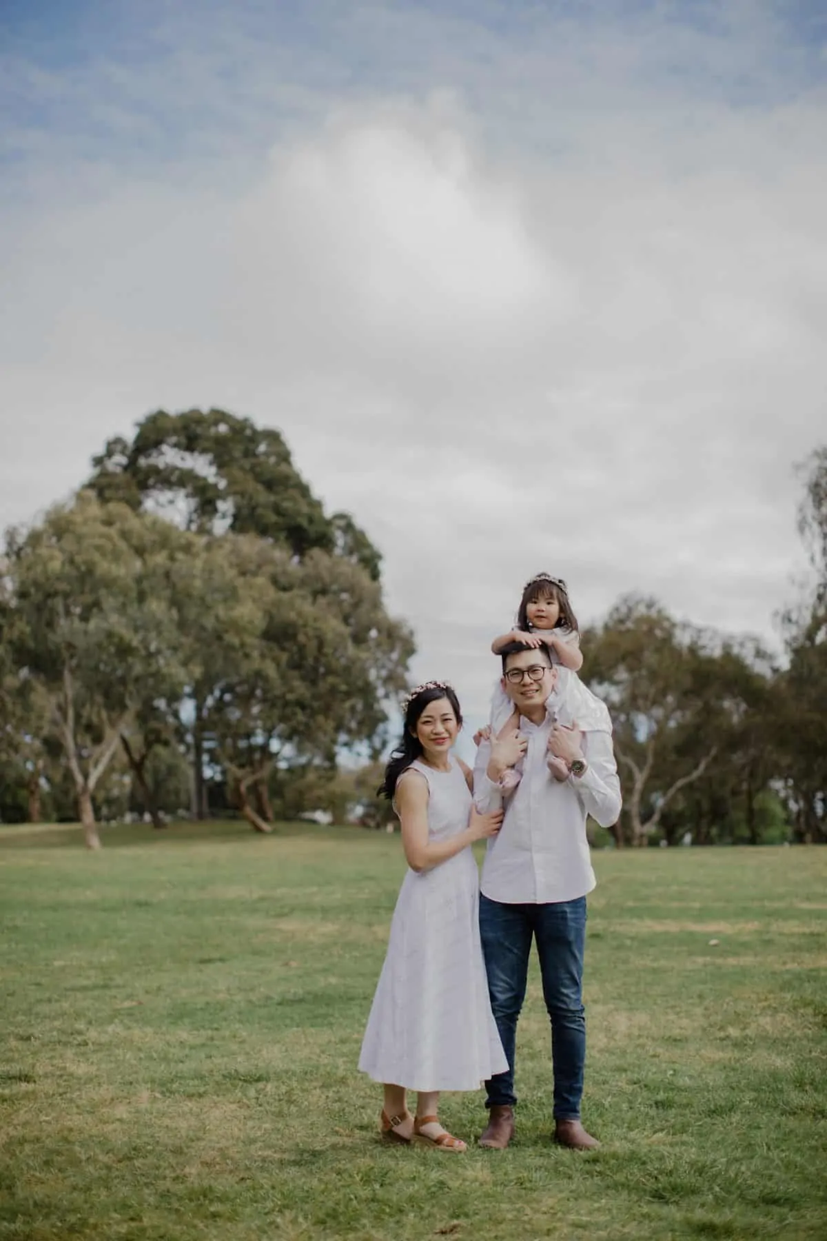 Happy Family Portrait Session With fun relax casual cozy lifestyle playful at the green park