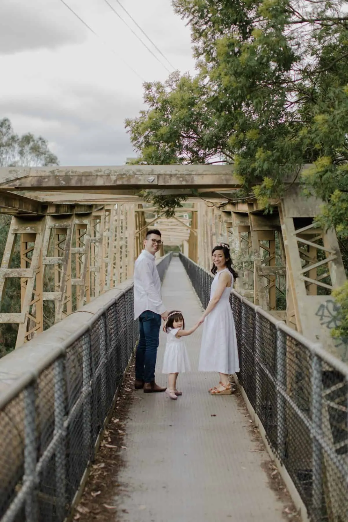 Happy Family Portrait Session With fun relax casual cozy lifestyle playful at the green park