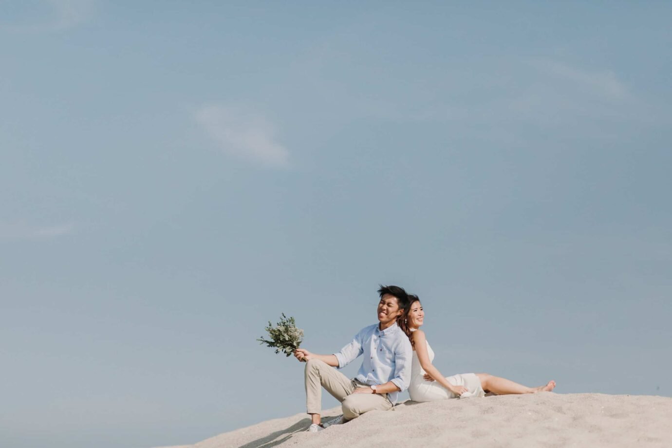 cliff choong destination portrait and wedding photographer malaysia kuala lumpur prewedding sunset golden sunrise shots bride and groom melaka desert couple kiss romantic intimate moment scene white sands