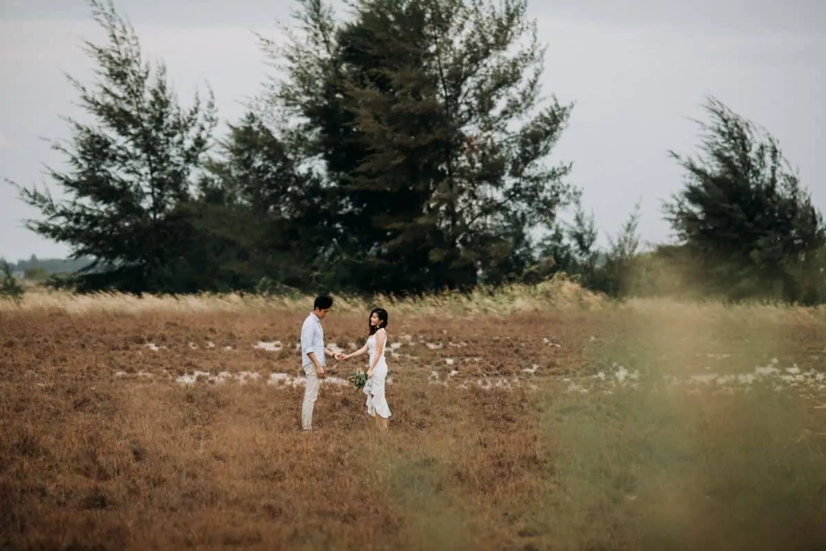 cliff choong destination portrait and wedding photographer malaysia kuala lumpur prewedding sunset golden sunrise shots bride and groom melaka desert couple kiss romantic intimate moment scene white sands