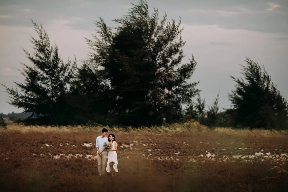 cliff choong destination portrait and wedding photographer malaysia kuala lumpur prewedding sunset golden sunrise shots bride and groom melaka desert couple kiss romantic intimate moment scene white sands