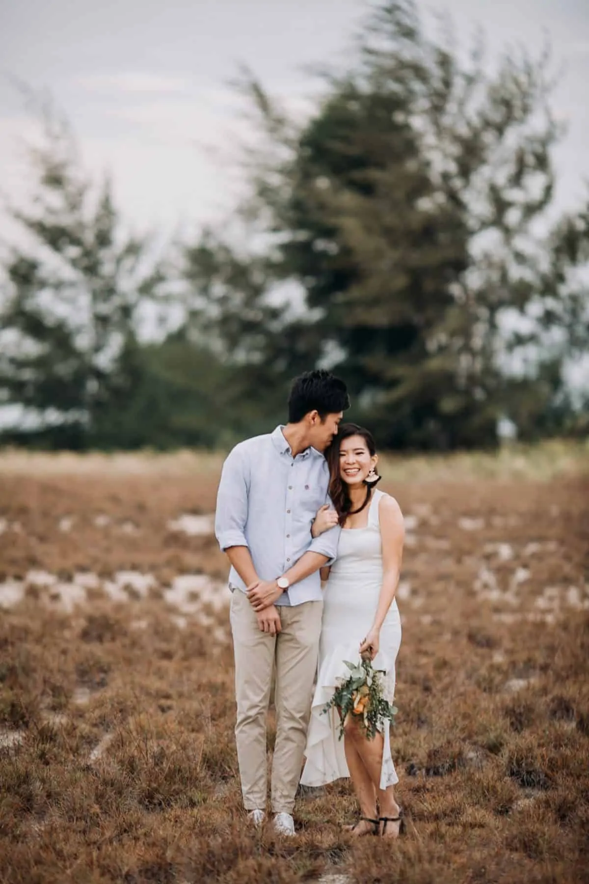 cliff choong destination portrait and wedding photographer malaysia kuala lumpur prewedding sunset golden sunrise shots bride and groom melaka desert couple kiss romantic intimate moment scene white sands