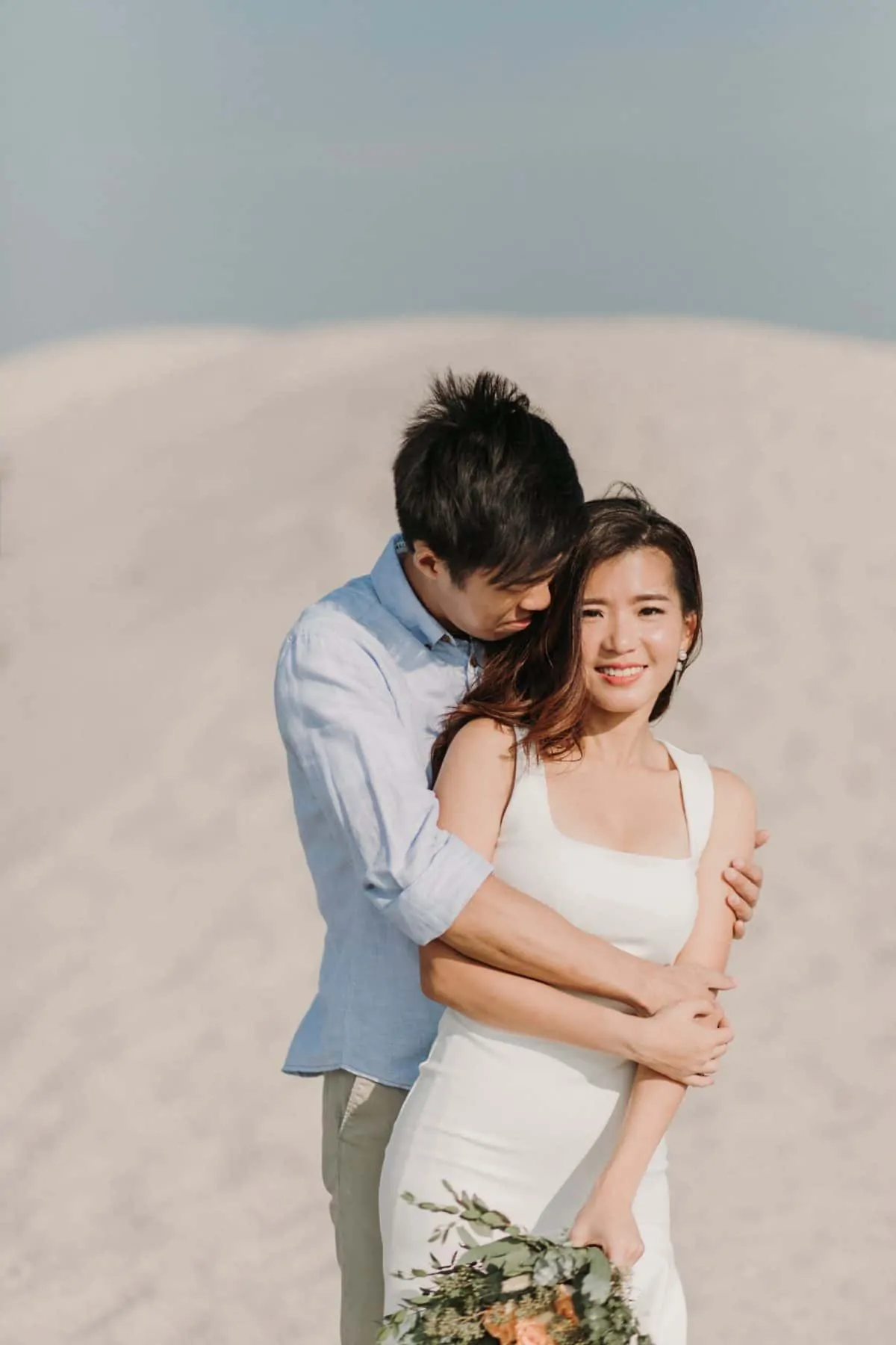 cliff choong destination portrait and wedding photographer malaysia kuala lumpur prewedding sunset golden sunrise shots bride and groom melaka desert couple kiss romantic intimate moment scene white sands