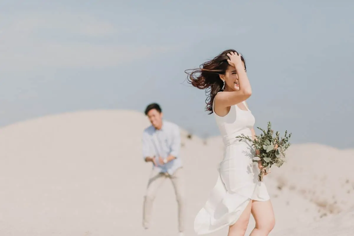 cliff choong destination portrait and wedding photographer malaysia kuala lumpur prewedding sunset golden sunrise shots bride and groom melaka desert couple kiss romantic intimate moment scene white sands