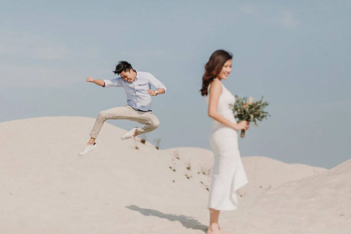 cliff choong destination portrait and wedding photographer malaysia kuala lumpur prewedding sunset golden sunrise shots bride and groom melaka desert couple kiss romantic intimate moment scene white sands