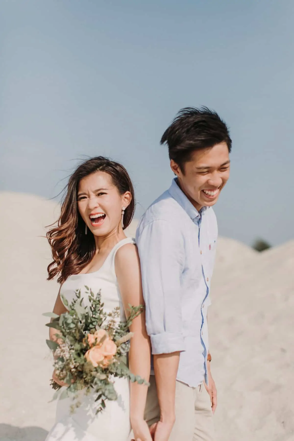cliff choong destination portrait and wedding photographer malaysia kuala lumpur prewedding sunset golden sunrise shots bride and groom melaka desert couple kiss romantic intimate moment scene white sands