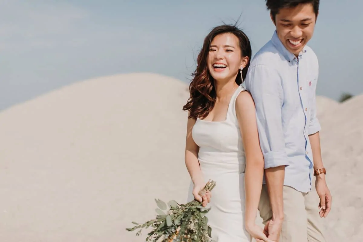 cliff choong destination portrait and wedding photographer malaysia kuala lumpur prewedding sunset golden sunrise shots bride and groom melaka desert couple kiss romantic intimate moment scene white sands