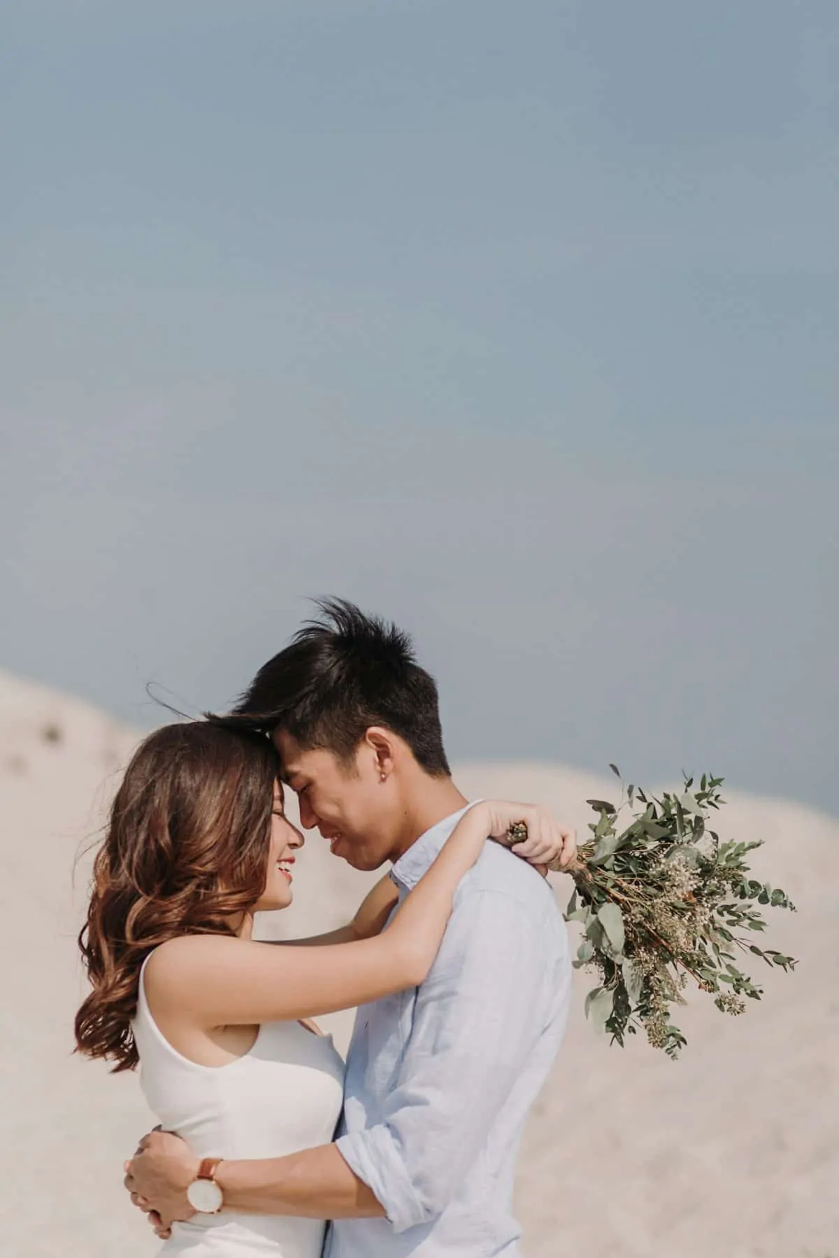 cliff choong destination portrait and wedding photographer malaysia kuala lumpur prewedding sunset golden sunrise shots bride and groom melaka desert couple kiss romantic intimate moment scene white sands