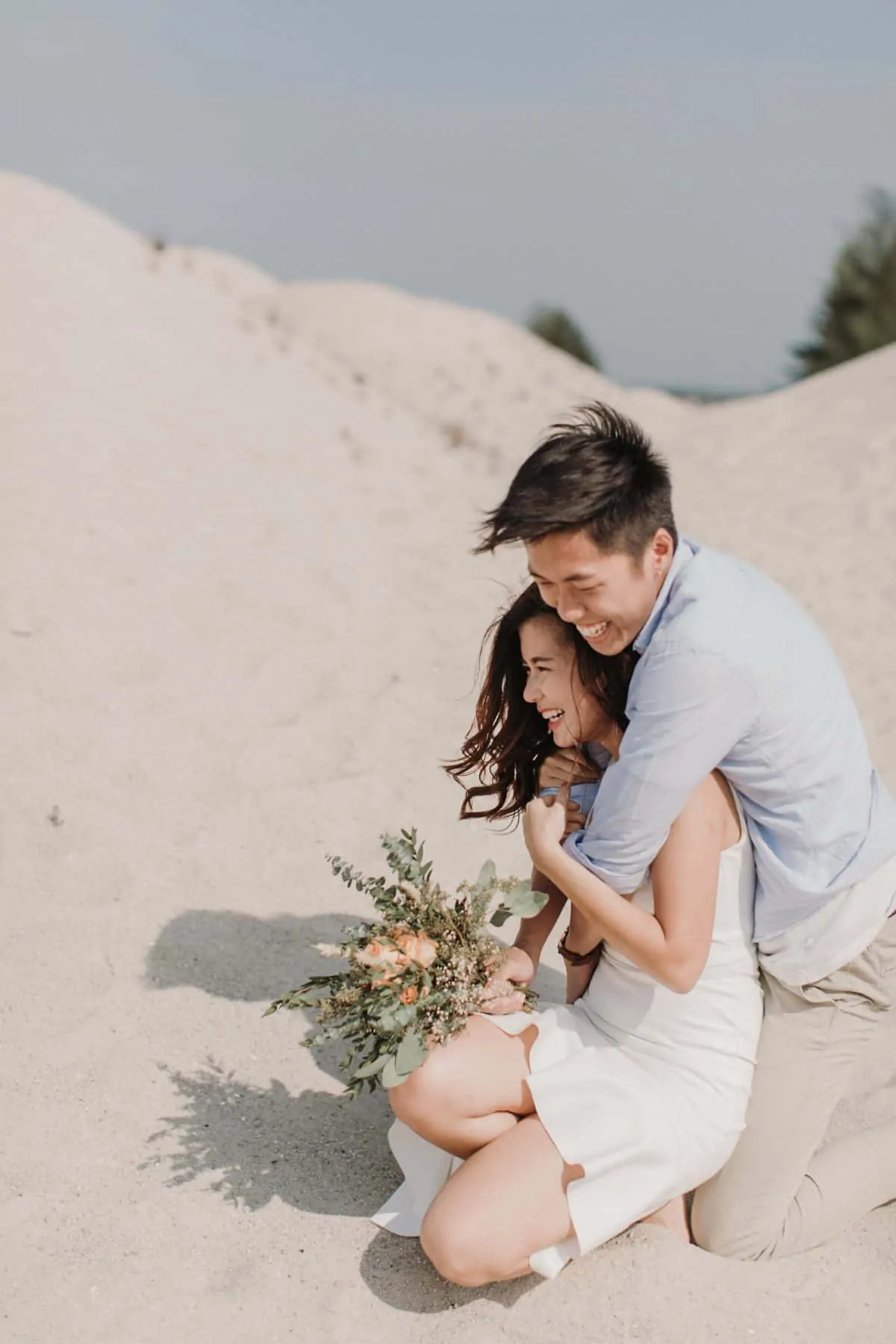 cliff choong destination portrait and wedding photographer malaysia kuala lumpur prewedding sunset golden sunrise shots bride and groom melaka desert couple kiss romantic intimate moment scene white sands rustic