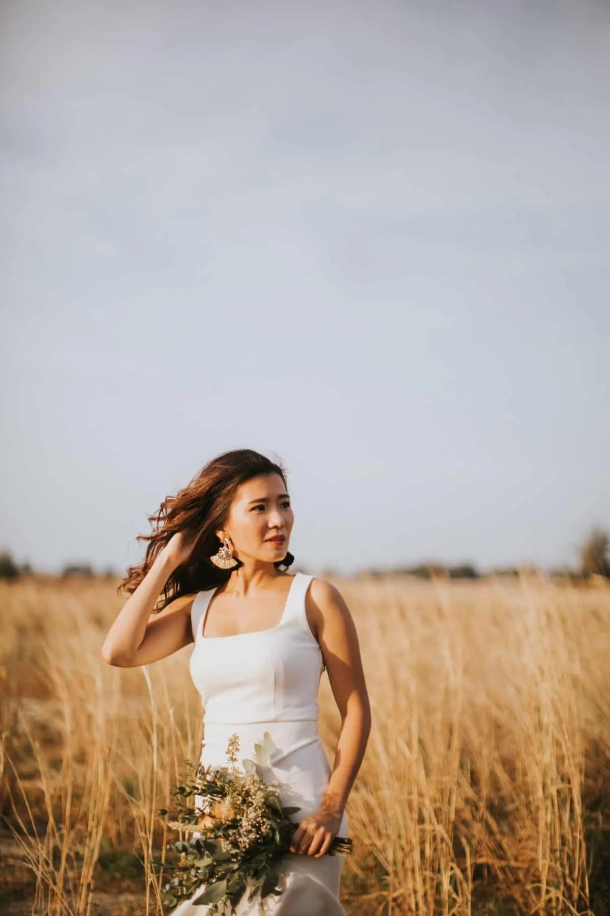 cliff choong destination portrait and wedding photographer malaysia kuala lumpur prewedding sunset golden sunrise shots bride and groom melaka desert couple kiss romantic intimate moment scene white sands