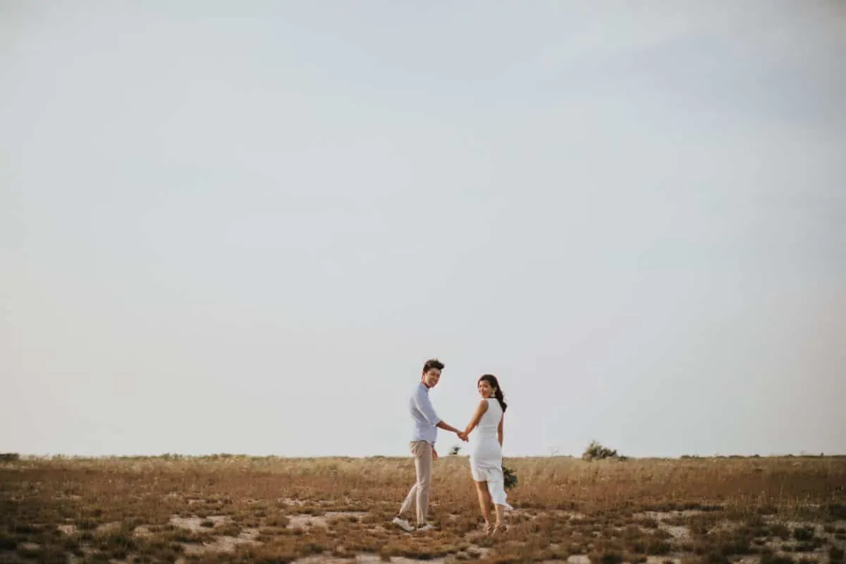 cliff choong destination portrait and wedding photographer malaysia kuala lumpur prewedding sunset golden sunrise shots bride and groom melaka desert couple kiss romantic intimate moment scene white sands