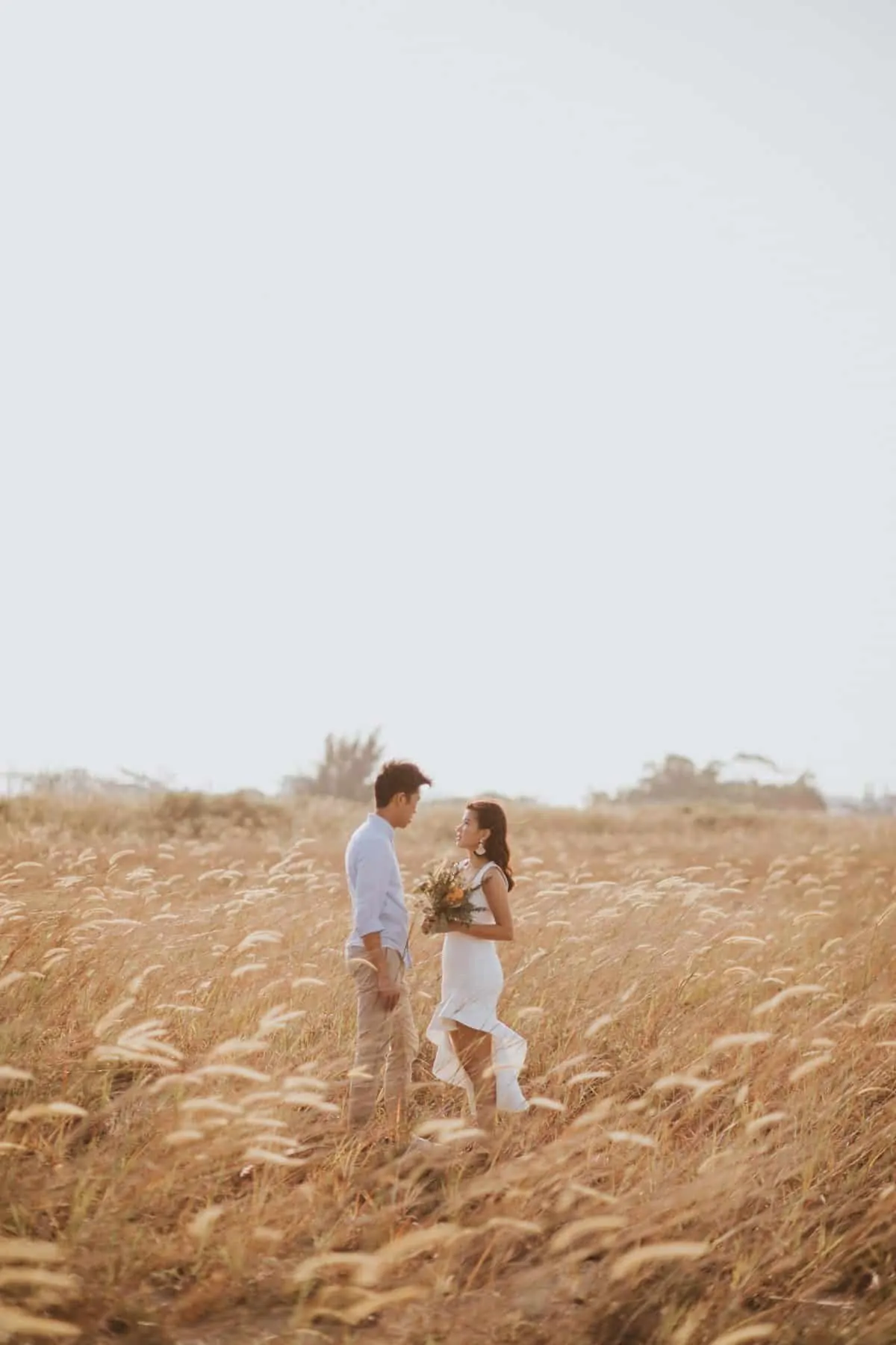 cliff choong destination portrait and wedding photographer malaysia kuala lumpur prewedding sunset golden sunrise shots bride and groom melaka desert couple kiss romantic intimate moment scene white sands