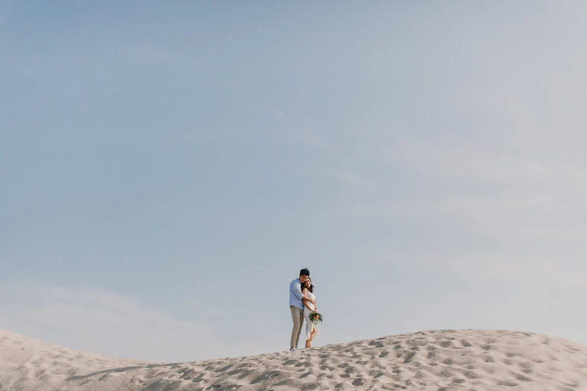 cliff choong destination portrait and wedding photographer malaysia kuala lumpur prewedding sunset golden sunrise shots bride and groom melaka desert couple kiss romantic intimate moment scene white sands