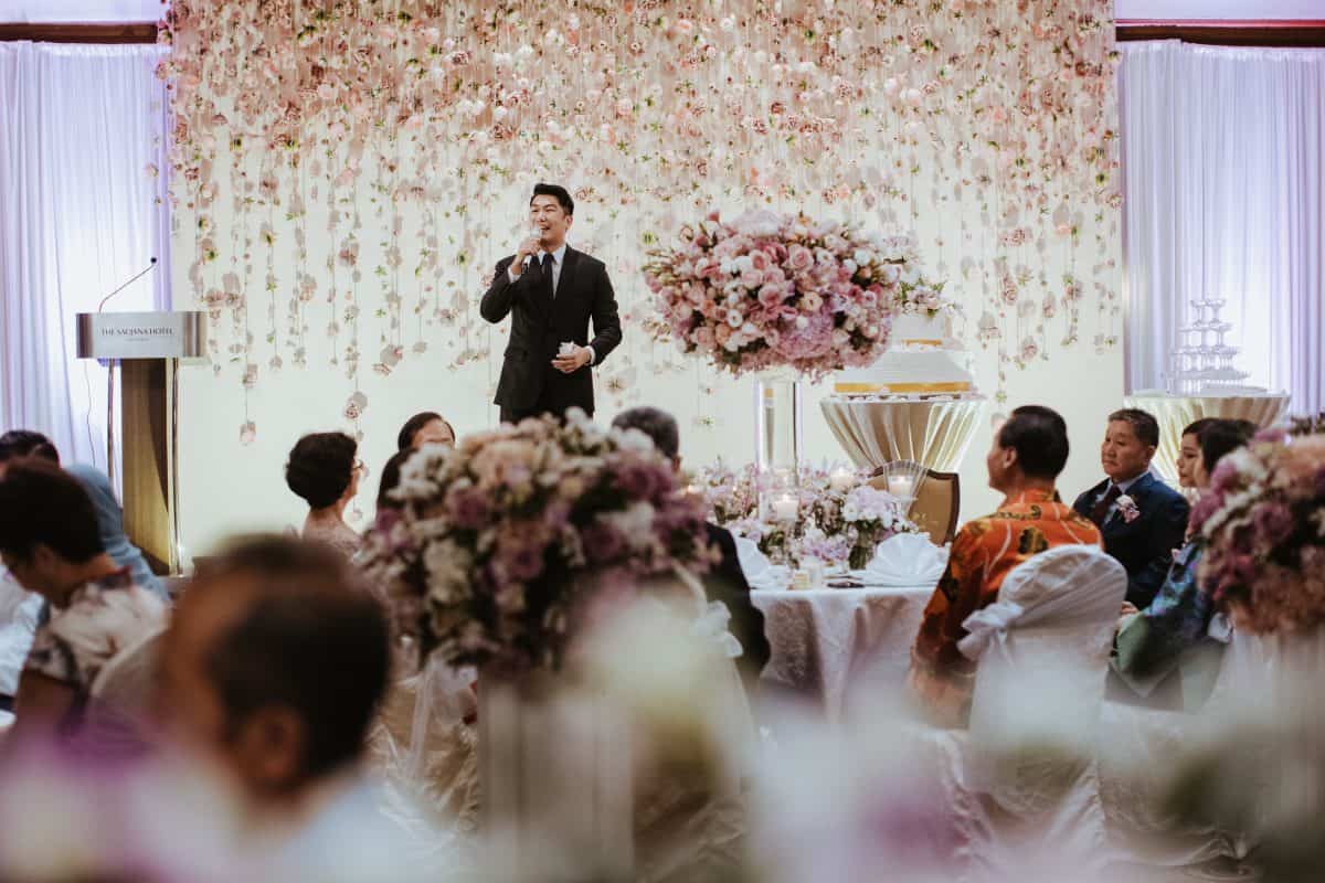Rose Gold Wedding Dinner Reception at The Saujana Hotel Subang Kuala Lumpur malaysia cliff choong the cross effects kevin tan destination portrait and wedding photographer malaysia kuala lumpur bride and groom couple kiss romantic intimate moment scene 