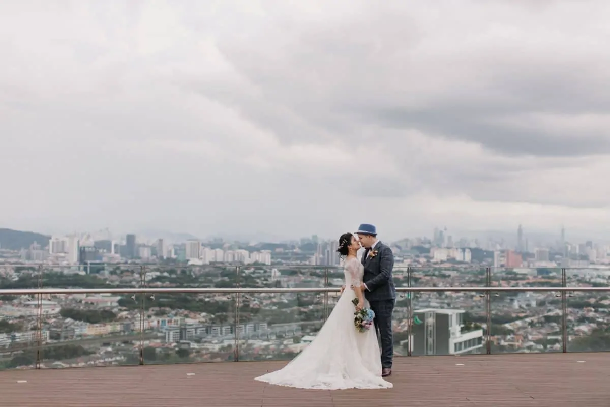 white Chrismas Color Wedding New World Petaling Jaya Hotel cliff choong destination portrait and wedding photographer malaysia kuala lumpur bride and groom romantic intimate moment scene bridesmaids beautiful emotional moments wedding details bridal dress suit getting ready shot