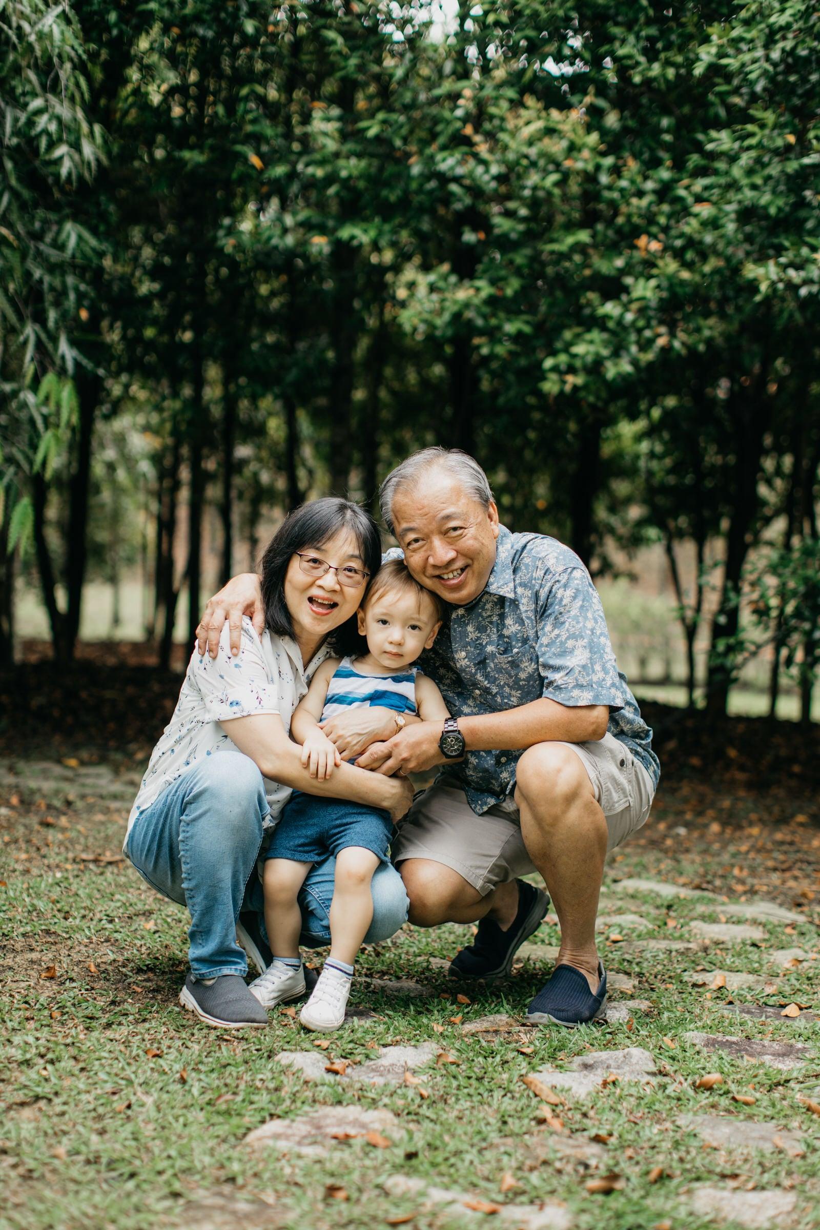 Cute little boy with grandpa and grandma Damansar Tropical Family Portrait Session in Kuala Lumpur Malaysia