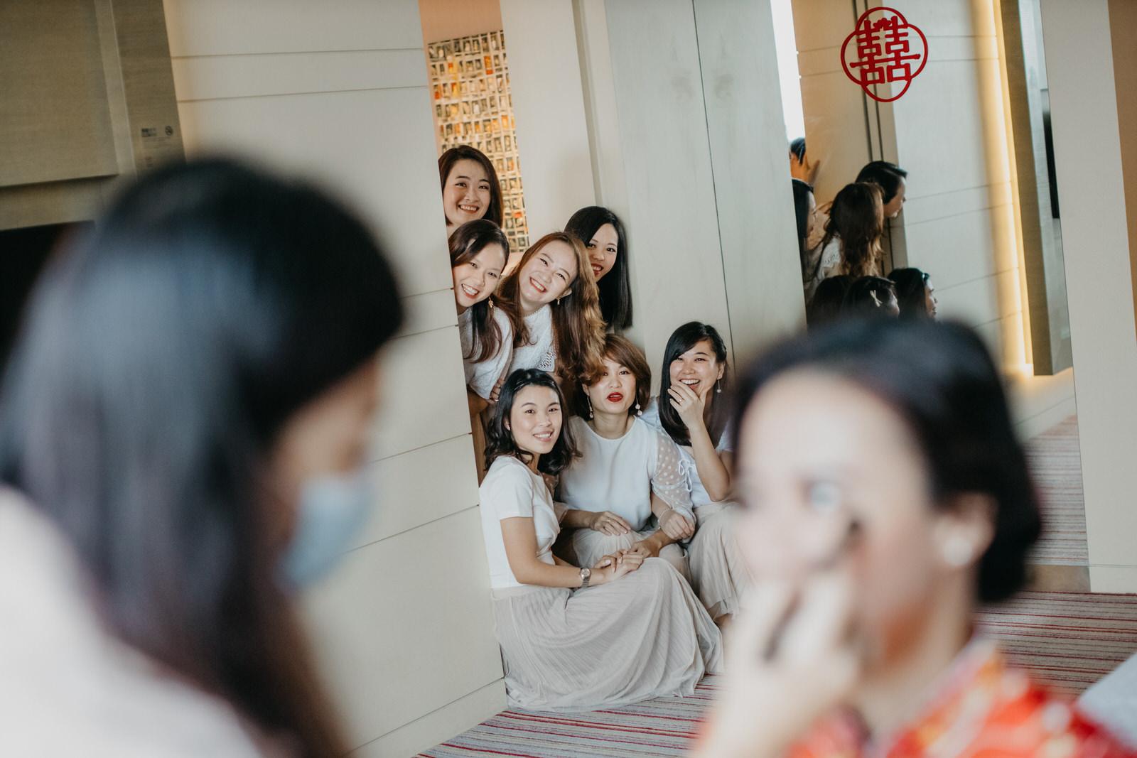 Bride on Red Chinese Kwa Moment Shot with Bridesmaids Wedding in Kuala Lumpur
