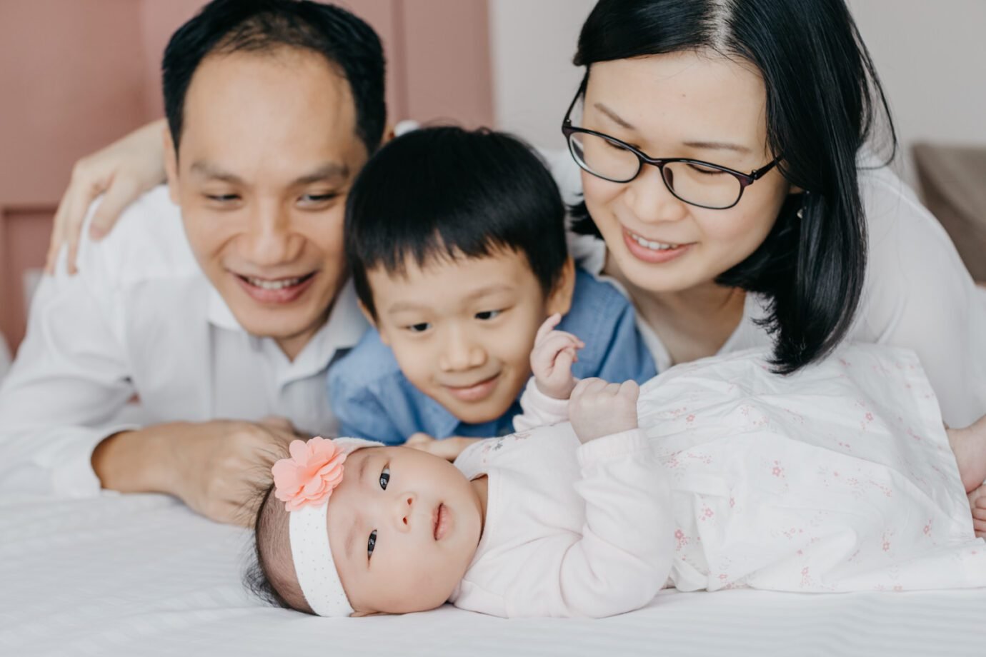 Capturing the pure joy of a newborn photography alongside their older sibling