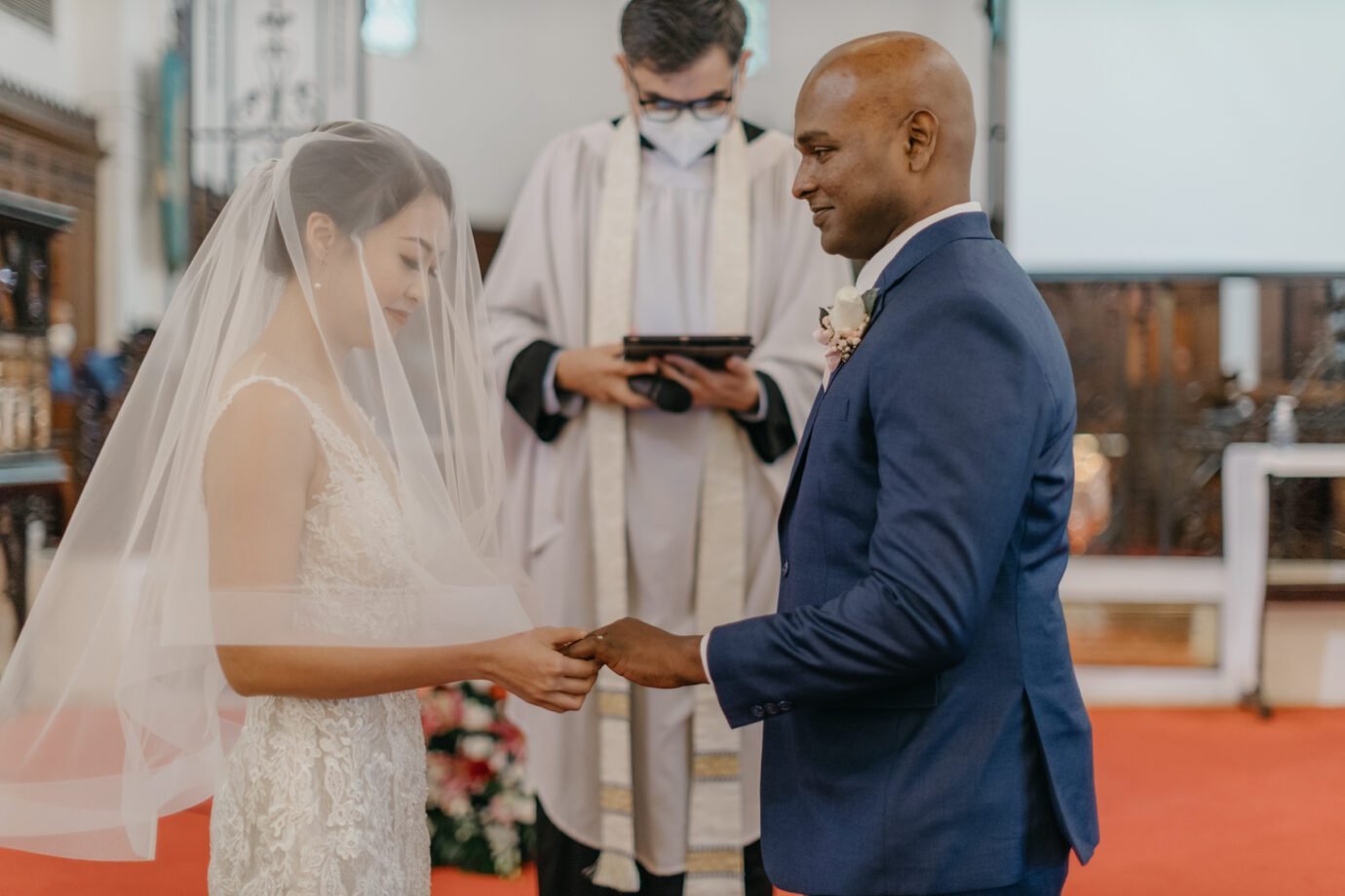 Exchange rings Janice and Christopher church wedding at St Mary's Cathedral Kuala Lumpur Love, democracy, and everlasting memories, Malaysia 15th General Election Day, Cliff Choong Photography