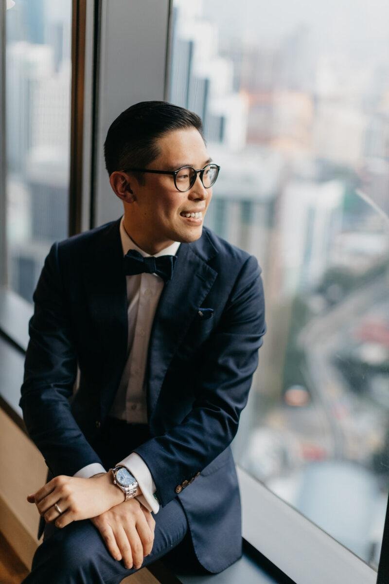 Groom getting ready. A dreamy and romantic, moon-themed wedding reception at The Equatorial Hotel Kuala Lumpur. Liyana and Carlos's love shone bright like the moon at this magical venue.