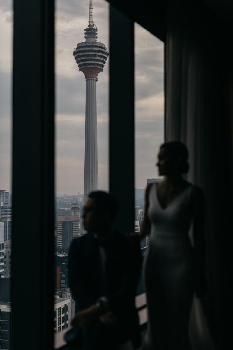 bride and groom getting ready. A dreamy and romantic, moon-themed wedding reception on the famous rooftop of The Equatorial Hotel Kuala Lumpur. Liyana and Carlos's love shone bright like the moon at this magical venue.