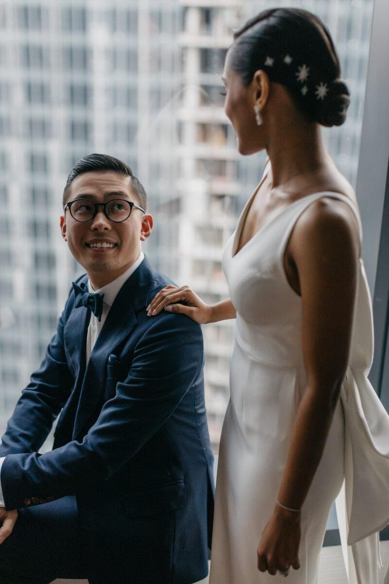 bride and groom getting ready. A dreamy and romantic, moon-themed wedding reception on the famous rooftop of The Equatorial Hotel Kuala Lumpur. Liyana and Carlos's love shone bright like the moon at this magical venue.