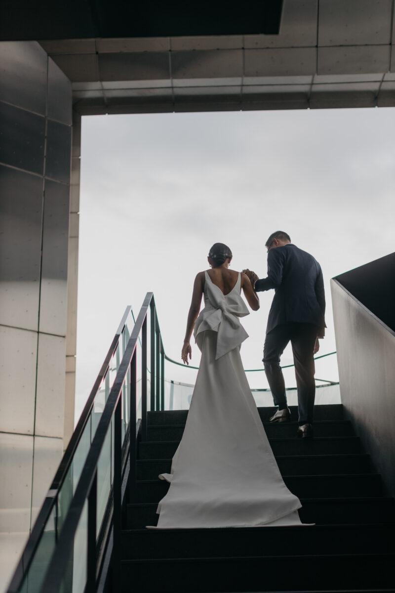 bride and groom photos on the rooftop of EQ Hotel Kuala Lumpur. A dreamy and romantic, moon-themed wedding reception on the famous rooftop of The Equatorial Hotel Kuala Lumpur. Liyana and Carlos's love shone bright like the moon at this magical venue.