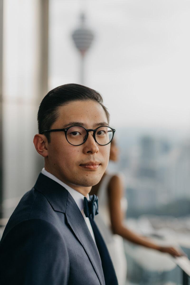 bride and groom photos on the rooftop of EQ Hotel Kuala Lumpur. A dreamy and romantic, moon-themed wedding reception on the famous rooftop of The Equatorial Hotel Kuala Lumpur. Liyana and Carlos's love shone bright like the moon at this magical venue.