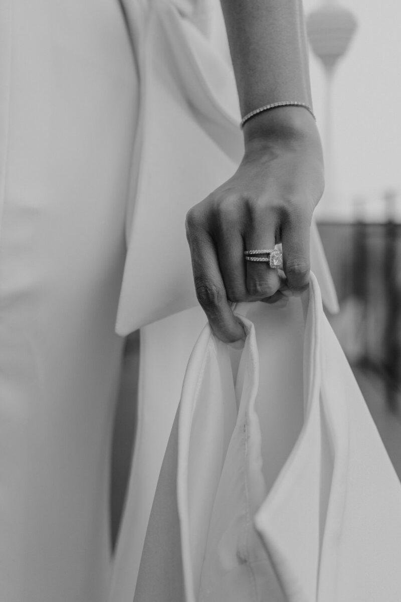 bride and groom photos on the rooftop of EQ Hotel Kuala Lumpur with KL tower as a backdrop. A dreamy and romantic, moon-themed wedding reception on the famous rooftop of The Equatorial Hotel Kuala Lumpur. Liyana and Carlos's love shone bright like the moon at this magical venue.
