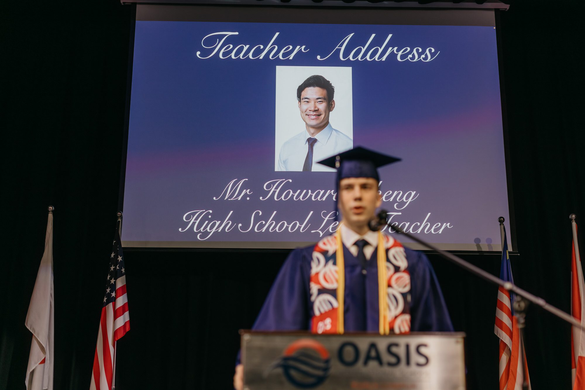 Precious moments being captured by the photographer, ensuring that memories from the Oasis International School 2023 graduation ceremony last for eternity.