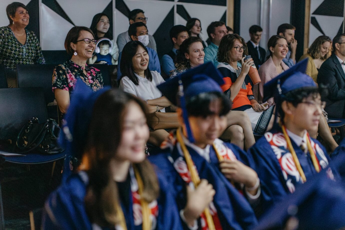 Precious moments being captured by the photographer, ensuring that memories from the Oasis International School 2023 graduation ceremony last for eternity.