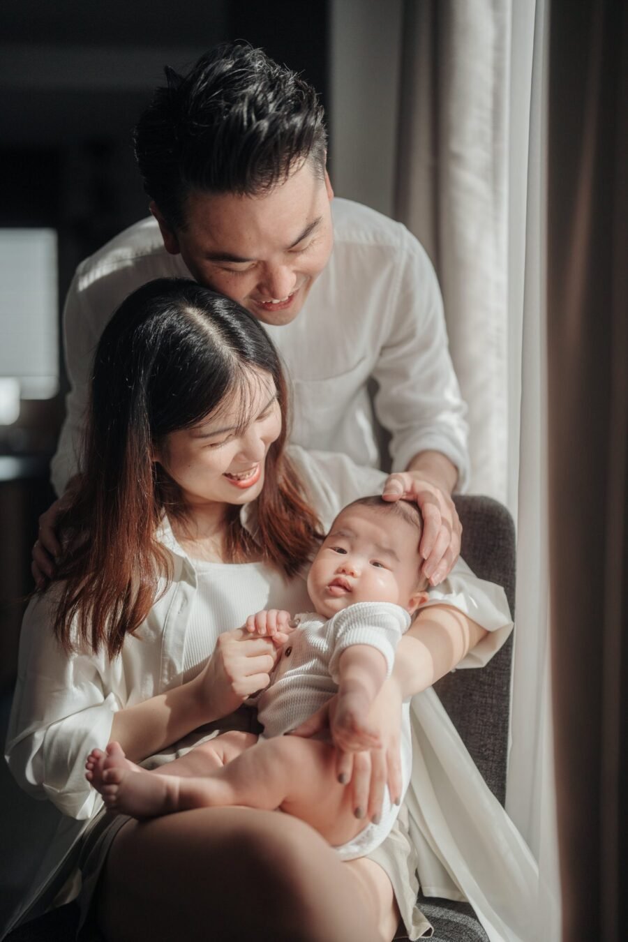 Emotional and real moments from a baby milestone shoot – Cliff Choong Photography