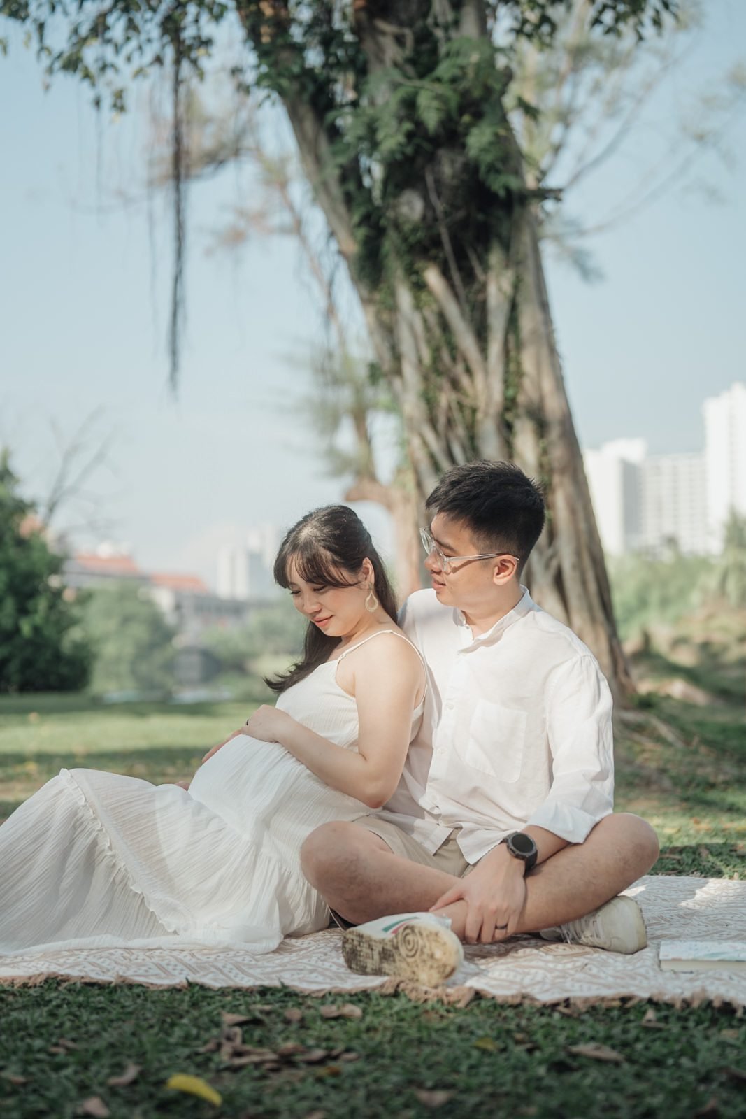 Maternity portrait surrounded by lush greenery in KL