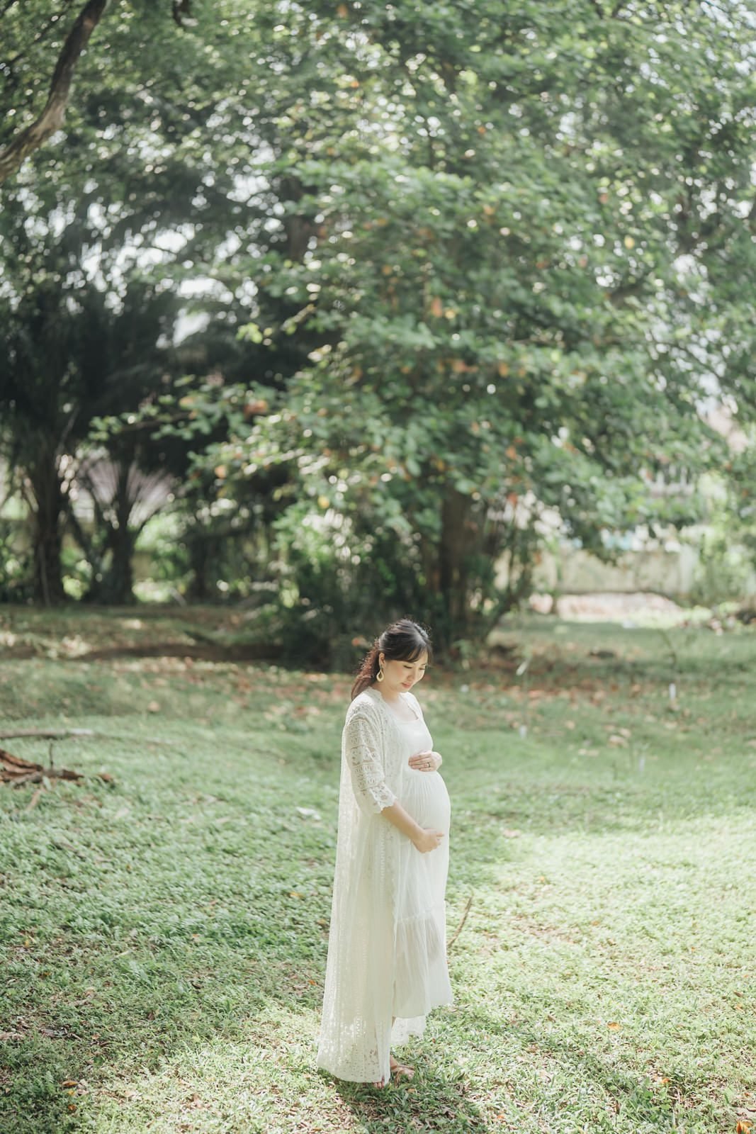 Pregnancy portrait in Kuala Lumpur with golden sunlight