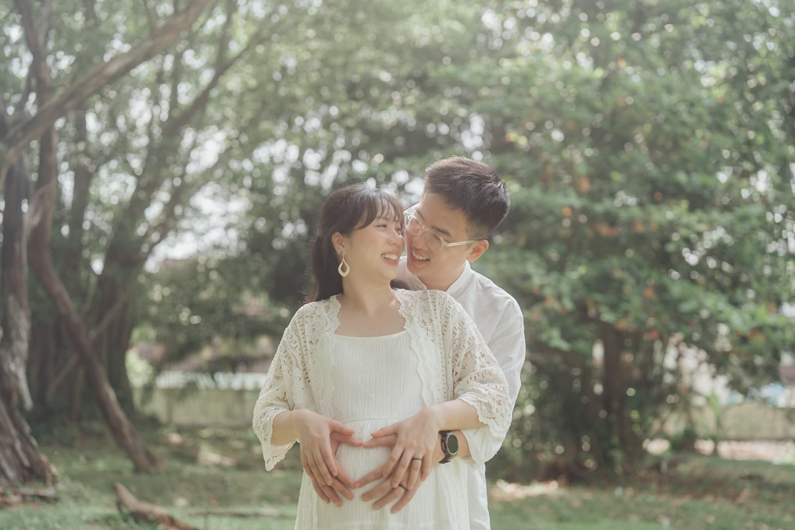 Couple during maternity photo session in Kuala Lumpur park