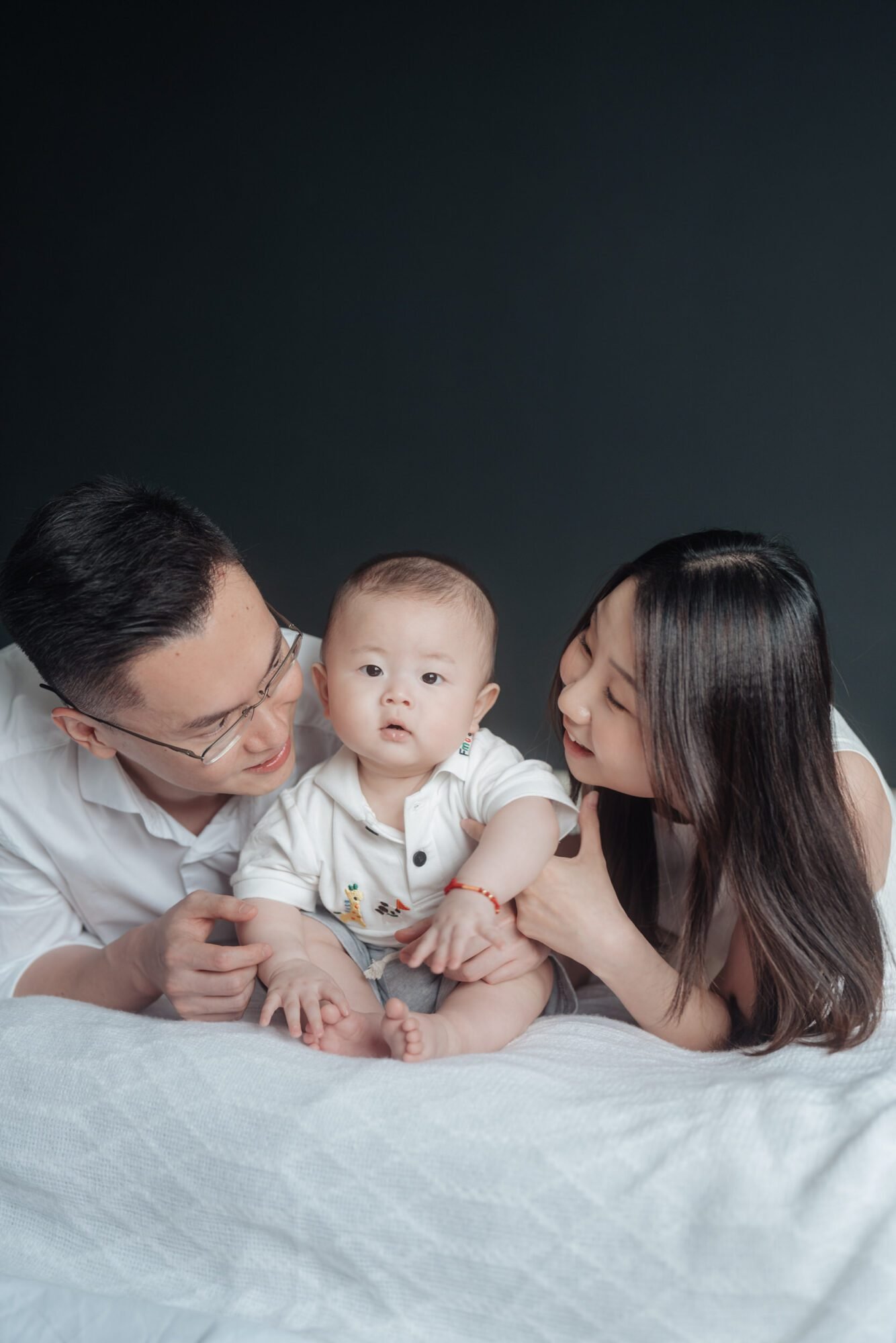 Parent–baby bonding moment during family photography in KL