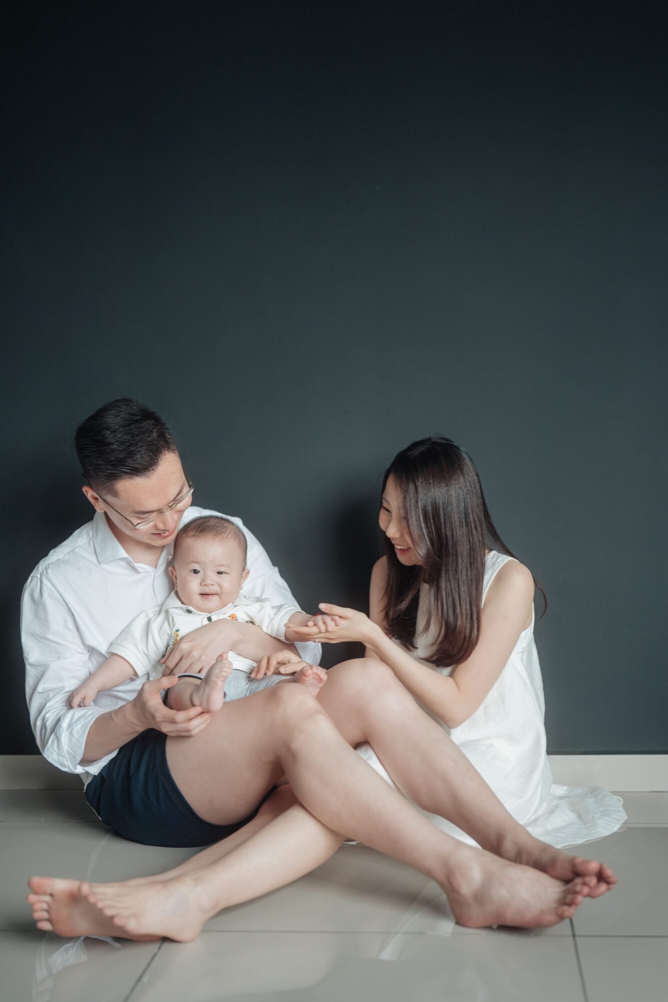 Parent–baby bonding moment during family photography in KL