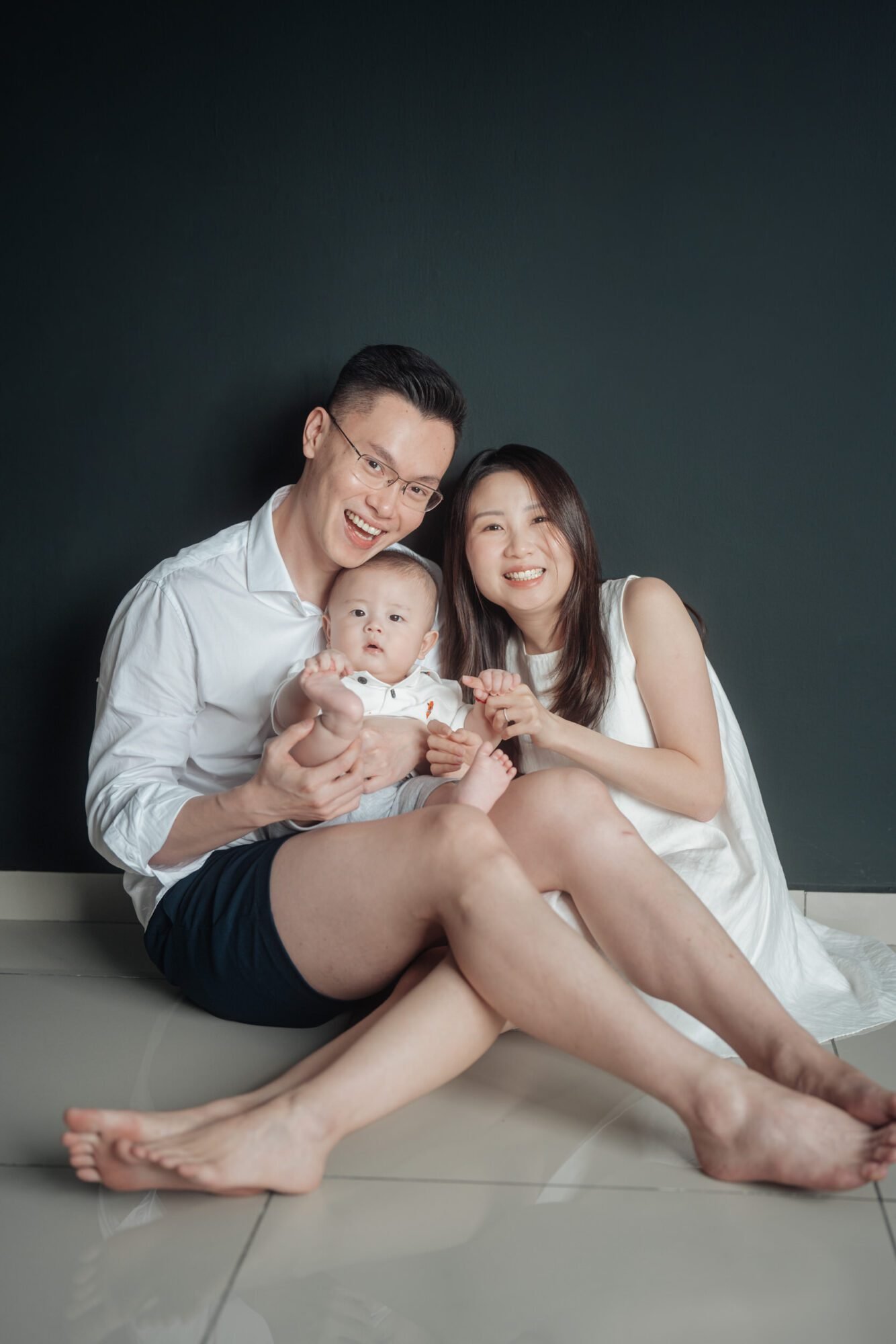 Parent–baby bonding moment during family photography in KL